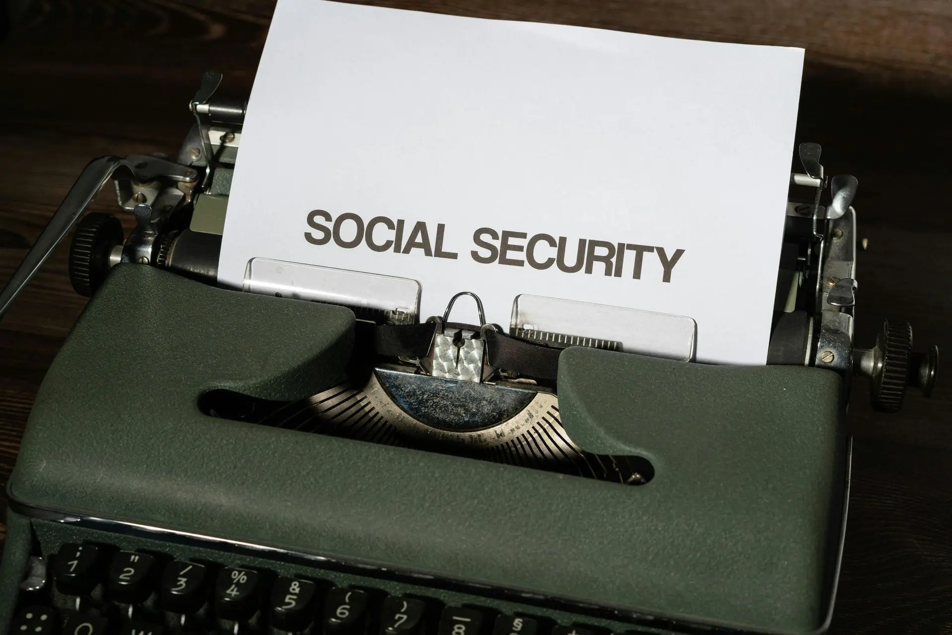 A typewriter with a paper labeled 'SOCIAL SECURITY'.